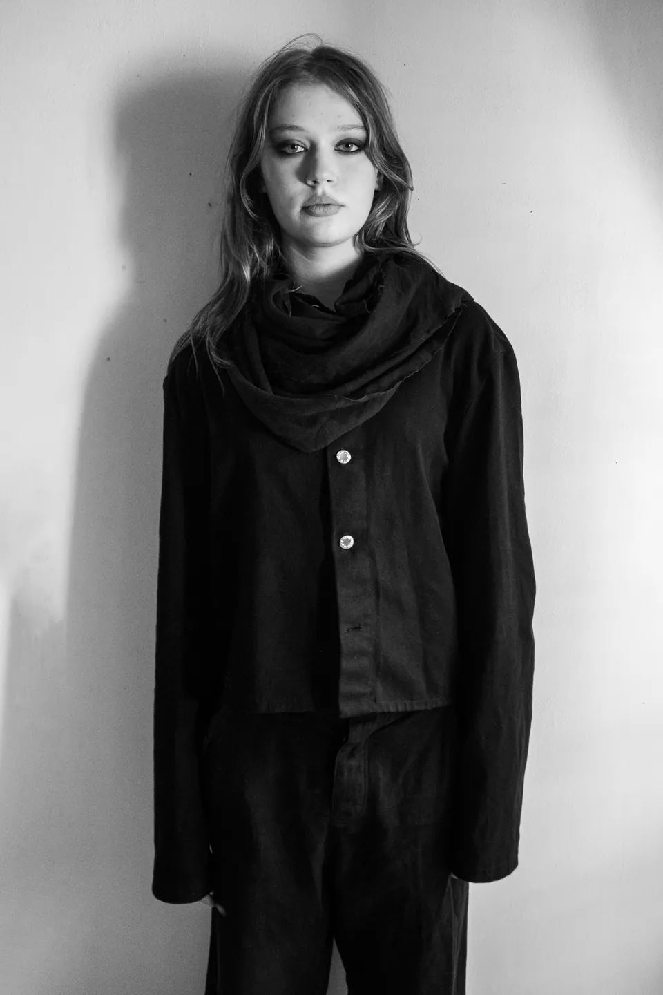 Sonder campaign image: black and white oversized silhouette with asymmetric cuts