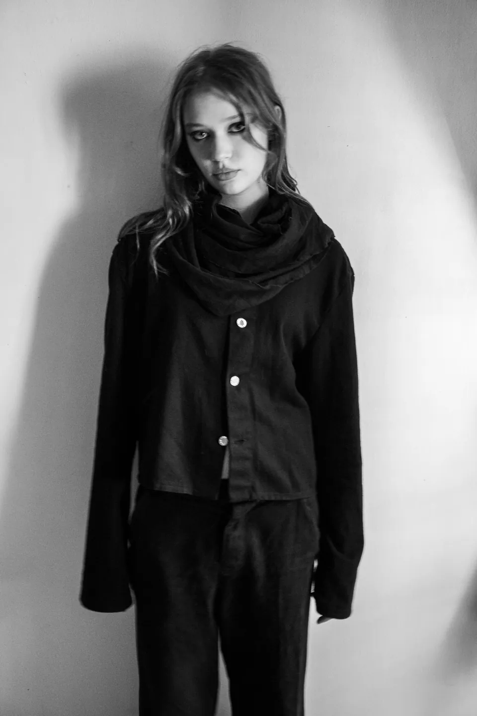 Sonder campaign image: asymmetric oversized silhouette in black and white