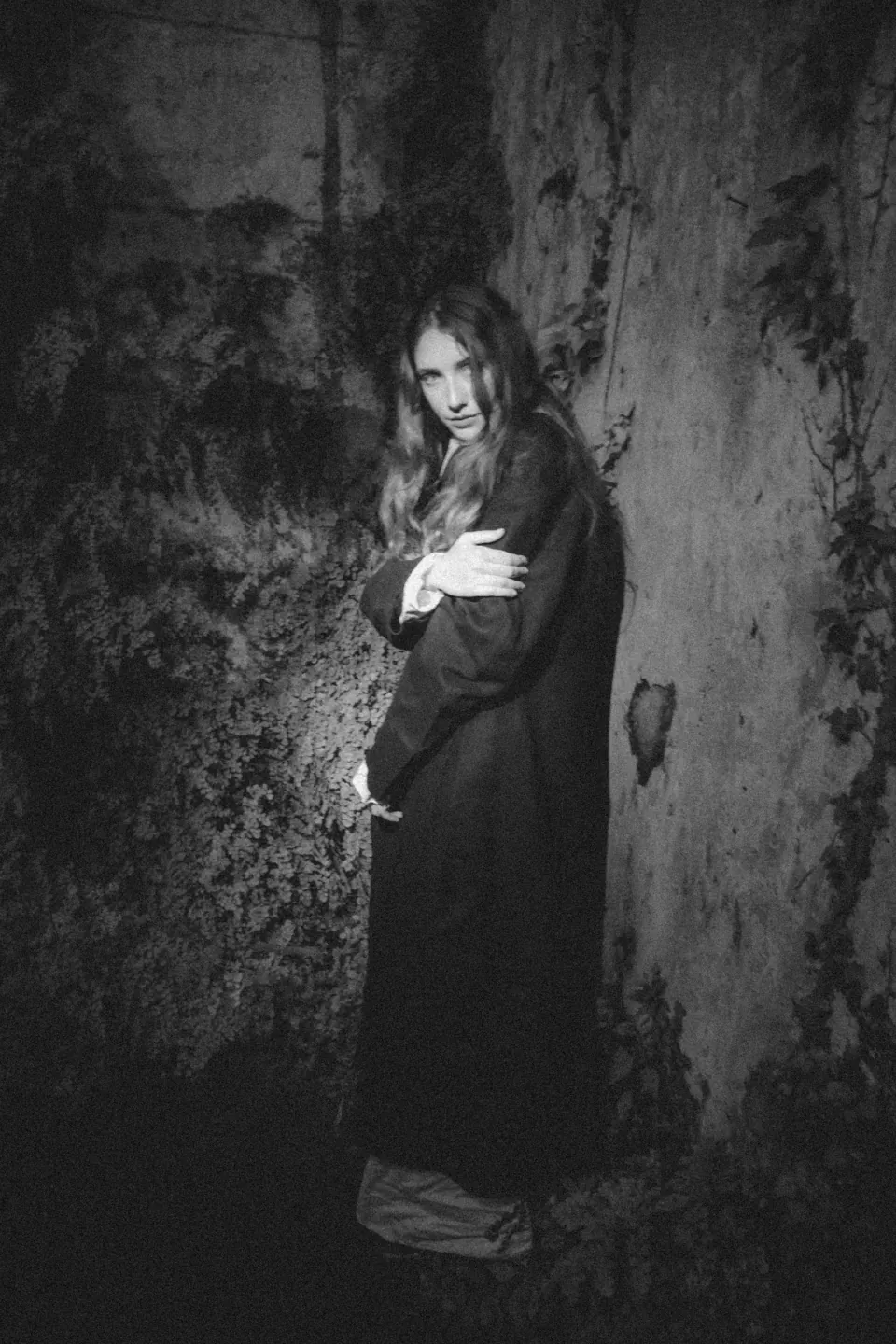 PostMortem Look 4: long waxed red asymmetric raglan coat over a floor-length asymmetric shirt